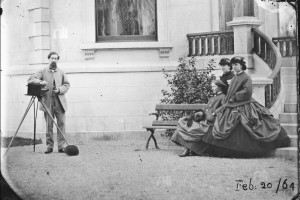 Lord Dunlo with stereo camera facing the three Dillon sisters at base of steps, Clonbrock House, Feb. 20th, 1864